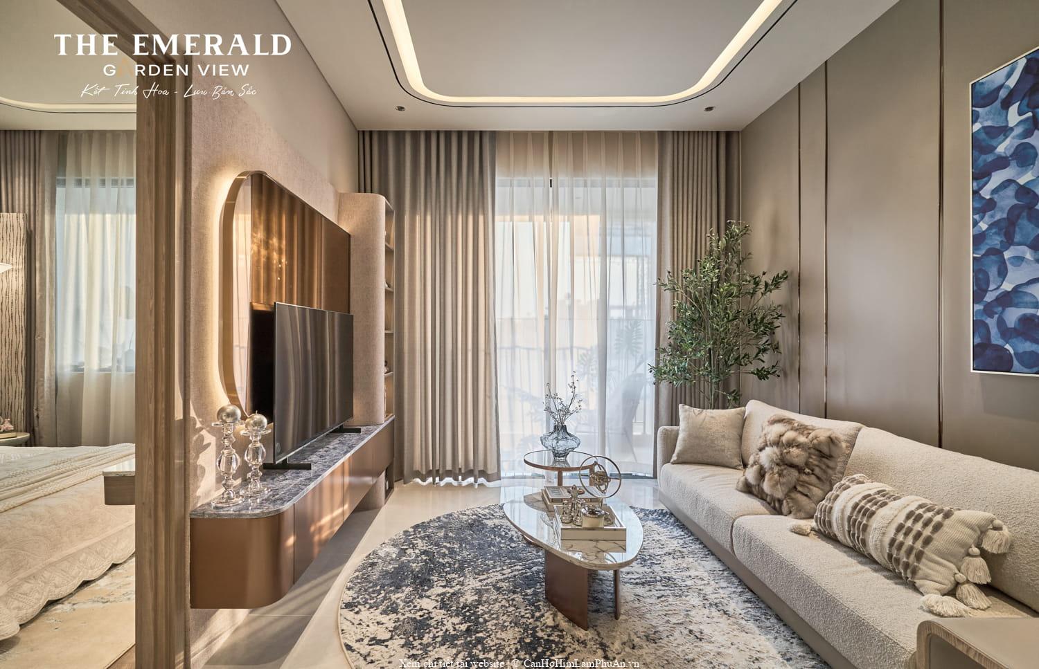 Phòng khách căn hộ mẫu 1PN+1 The Emerald Garden, bố trí ngay cạnh ban công với tầm nhìn từ phòng ra ngoài